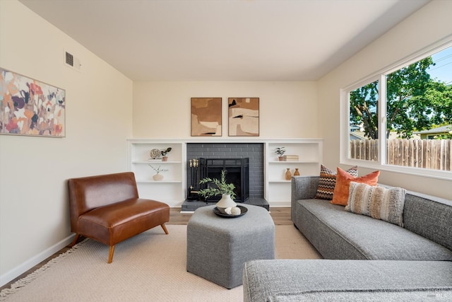 1828 Trower Ave, Napa, CA 94558 - living room featuring baseboards and a fireplace