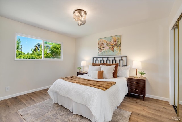1828 Trower Ave, Napa, CA 94558 - bedroom featuring baseboards, wood finished floors, and a closet