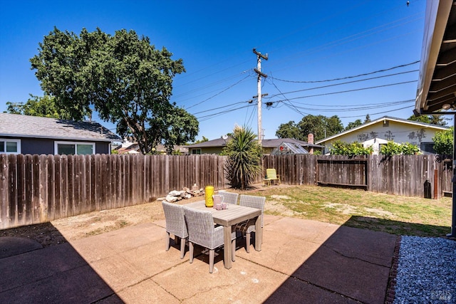 1828 Trower Ave, Napa, CA 94558 - view of patio with a fenced backyard and outdoor dining area