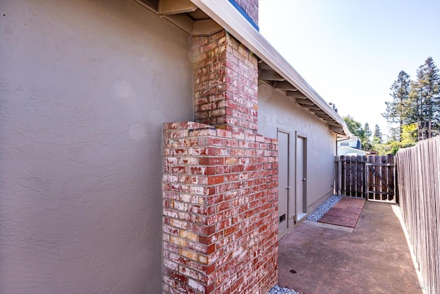 1828 Trower Ave, Napa, CA 94558 - view of side of home with stucco siding, fence, and brick siding