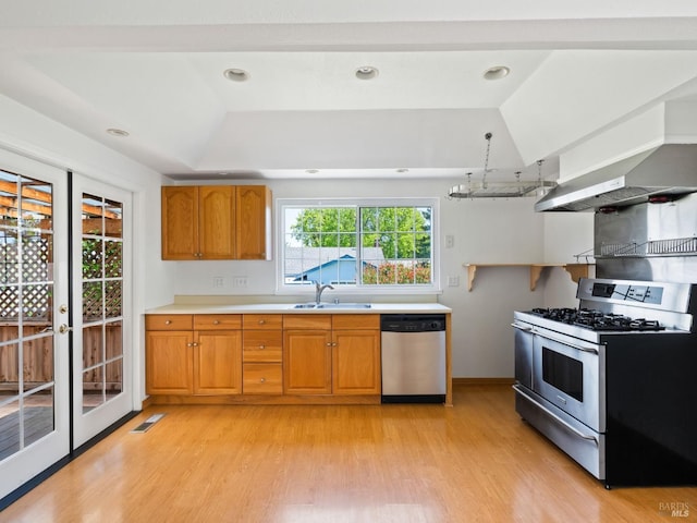 175 Temelec Cir, Sonoma, CA 95476 - kitchen with stainless steel appliances, light wood-type flooring, brown cabinetry, a sink, and recessed lighting