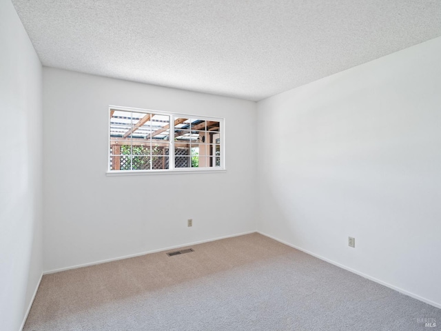 175 Temelec Cir, Sonoma, CA 95476 - carpeted spare room with a textured ceiling and baseboards
