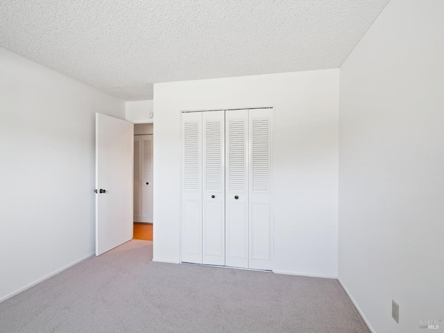 175 Temelec Cir, Sonoma, CA 95476 - unfurnished bedroom featuring carpet, a closet, and a textured ceiling
