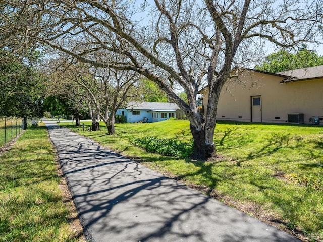 175 Temelec Cir, Sonoma, CA 95476 - view of side of property featuring central AC, stucco siding, a yard, and crawl space