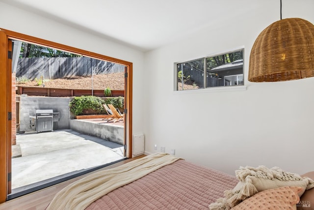 bedroom featuring a wood stove