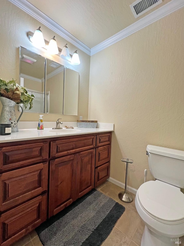 24034 Willow Ln, Willits, CA 95490 - bathroom featuring toilet, vanity, ornamental molding, baseboards, and tile patterned flooring