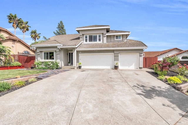 2812 Silver Fox Cir, Fairfield, CA 94534 - view of front of home featuring concrete driveway, a tile roof, stucco siding, and a garage