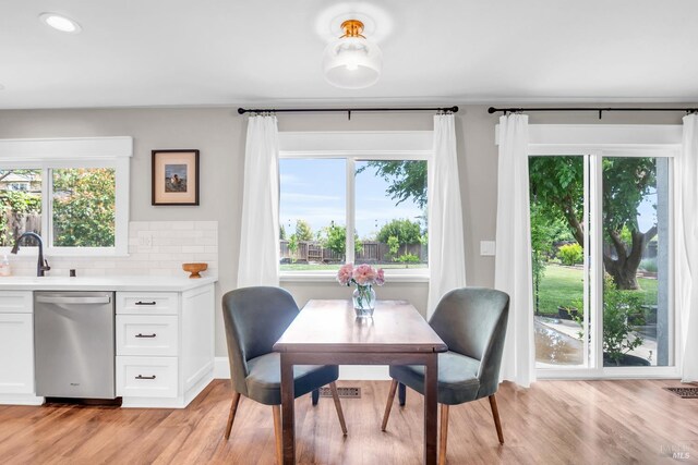 2812 Silver Fox Cir, Fairfield, CA 94534 - dining space with light wood-type flooring, healthy amount of natural light, and recessed lighting