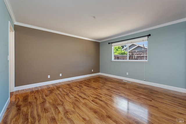 431 University St, Healdsburg, CA 95448 - empty room featuring ornamental molding, baseboards, and wood finished floors