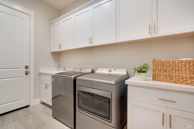 223 Pheasant Ct, Napa, CA 94558 - washroom with cabinet space, washer and clothes dryer, and baseboards