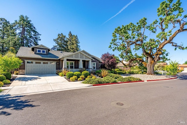 223 Pheasant Ct, Napa, CA 94558 - craftsman house featuring an attached garage, driveway, and stone siding