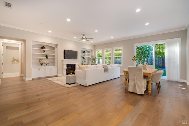 223 Pheasant Ct, Napa, CA 94558 - living area with crown molding, ceiling fan, light wood-style flooring, recessed lighting, and built in features