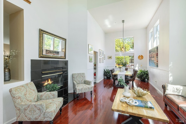 2130 Camenson St, Napa, CA 94558 - living area featuring a towering ceiling, a fireplace, and wood finished floors