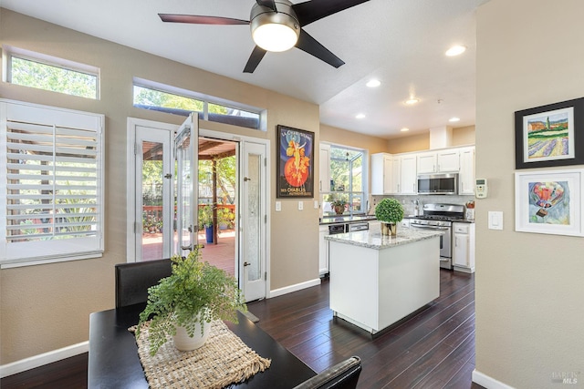2130 Camenson St, Napa, CA 94558 - kitchen with appliances with stainless steel finishes, white cabinets, plenty of natural light, and ceiling fan