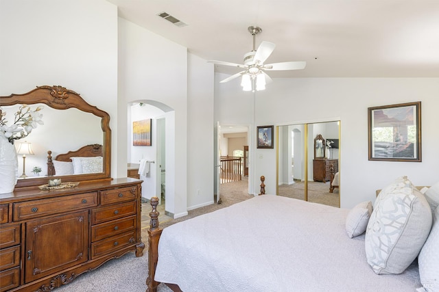 2130 Camenson St, Napa, CA 94558 - bedroom with light colored carpet, arched walkways, high vaulted ceiling, a closet, and ensuite bath