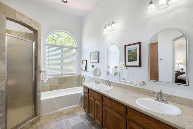 2130 Camenson St, Napa, CA 94558 - ensuite bathroom featuring a garden tub, a shower stall, double vanity, and stone finish floors
