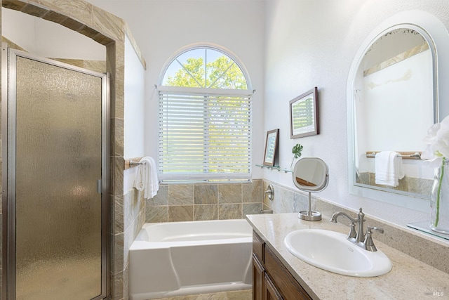 2130 Camenson St, Napa, CA 94558 - bathroom featuring vanity, a shower stall, a garden tub, and plenty of natural light