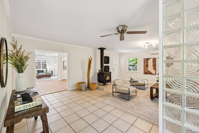 231 Railroad Ave, Woodacre, CA 94973 - living area with a wood stove, light tile patterned floors, a ceiling fan, ornamental molding, and baseboards