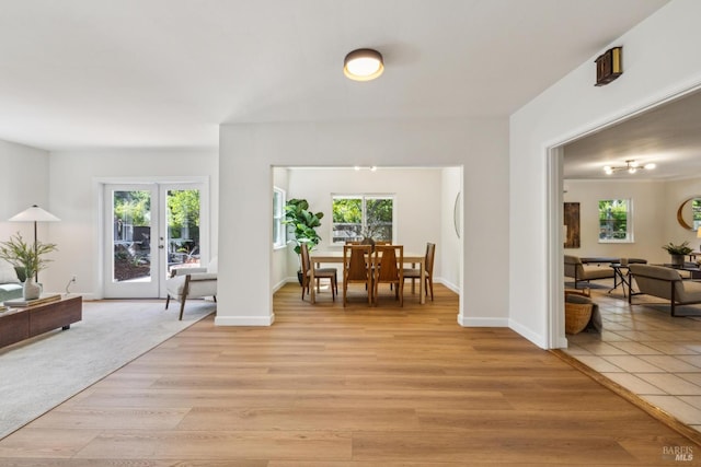 231 Railroad Ave, Woodacre, CA 94973 - dining area with light wood-style flooring, baseboards, and french doors