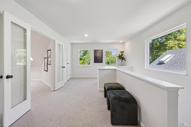231 Railroad Ave, Woodacre, CA 94973 - hallway featuring light colored carpet, baseboards, french doors, and recessed lighting