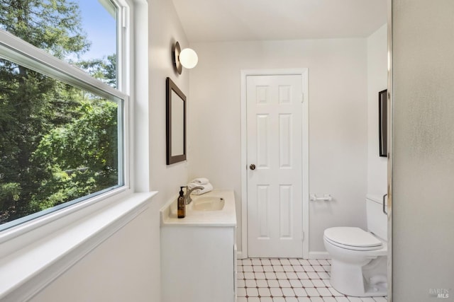 231 Railroad Ave, Woodacre, CA 94973 - bathroom with plenty of natural light, toilet, vanity, and baseboards