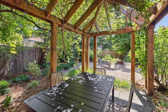 231 Railroad Ave, Woodacre, CA 94973 - view of patio featuring fence, a pergola, and a vegetable garden