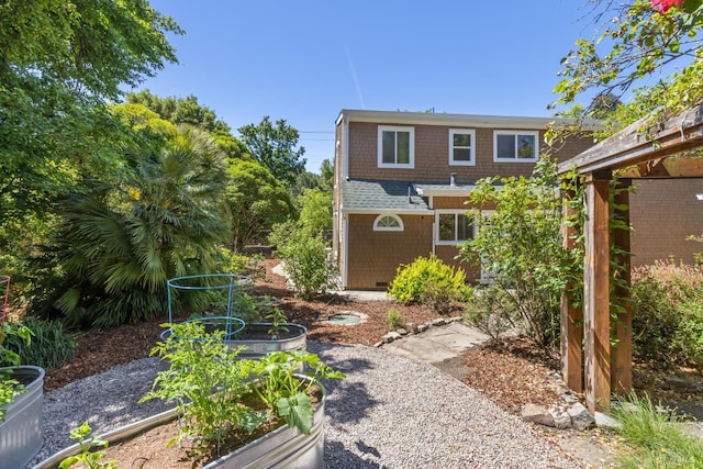 231 Railroad Ave, Woodacre, CA 94973 - rear view of property with a vegetable garden