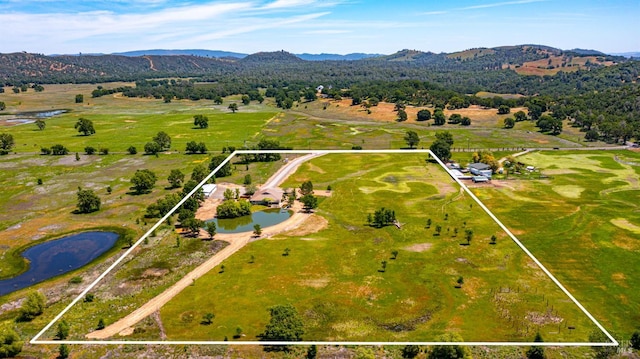 12285 High Valley Rd, Clearlake Oaks, CA 95423 - aerial view of property's location with property boundaries highlighted and a mountain backdrop