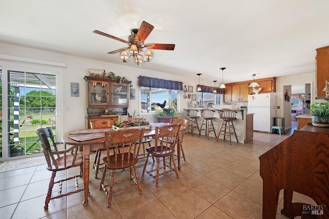 23180 Maffei Rd, Sonoma, CA 95476 - dining space with light tile patterned flooring, plenty of natural light, and ceiling fan
