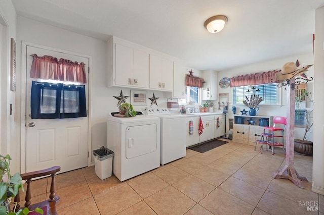 23180 Maffei Rd, Sonoma, CA 95476 - laundry room with independent washer and dryer, cabinet space, and light tile patterned floors