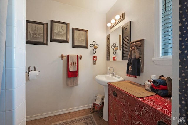 23180 Maffei Rd, Sonoma, CA 95476 - bathroom with tile patterned flooring, baseboards, and a sink