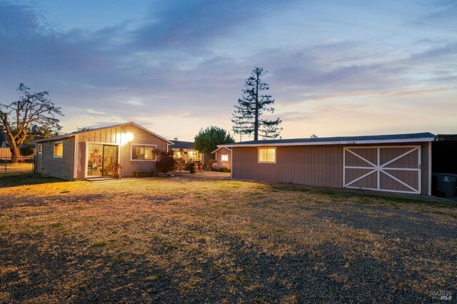 23180 Maffei Rd, Sonoma, CA 95476 - view of grassy yard with an outbuilding