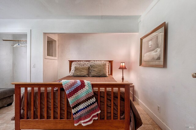 20215 Willow Rd, Monte Rio, CA 95462 - tiled bedroom with baseboards