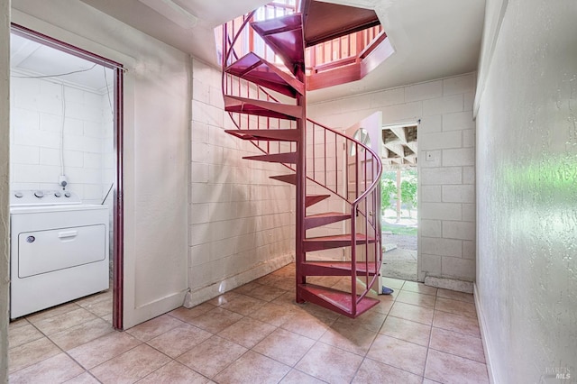 20215 Willow Rd, Monte Rio, CA 95462 - stairway featuring washer / clothes dryer, a textured wall, and tile patterned floors