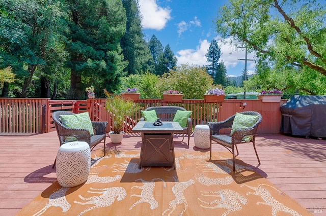 20215 Willow Rd, Monte Rio, CA 95462 - wooden deck featuring an outdoor fire pit