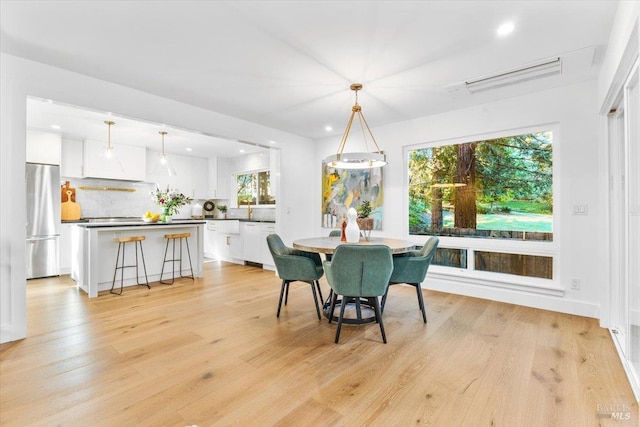 1358 Sylvan Ct, Healdsburg, CA 95448 - dining space with light wood-style floors and recessed lighting