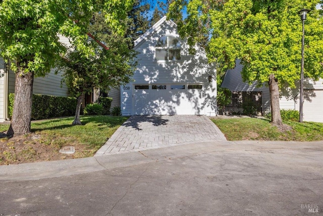 1358 Sylvan Ct, Healdsburg, CA 95448 - obstructed view of property featuring decorative driveway and a garage