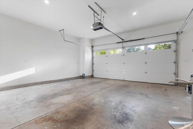 1358 Sylvan Ct, Healdsburg, CA 95448 - garage featuring a garage door opener, baseboards, and recessed lighting