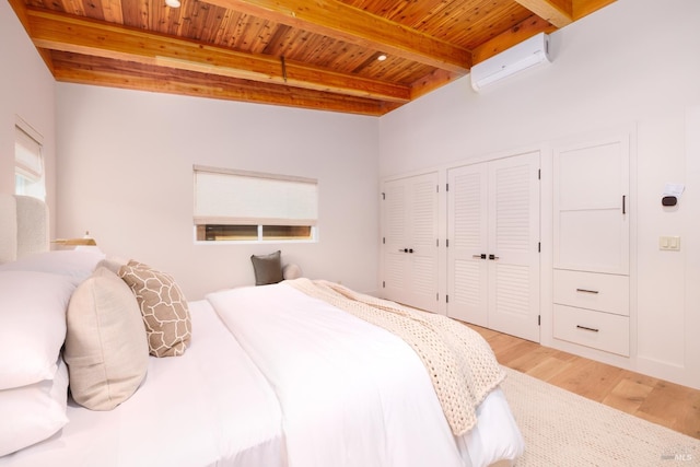 980 Trentadue Way, Healdsburg, CA 95448 - bedroom featuring an AC wall unit, wooden ceiling, light wood finished floors, and beamed ceiling