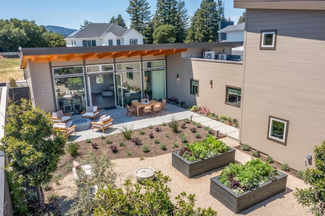 980 Trentadue Way, Healdsburg, CA 95448 - rear view of property featuring a garden, a patio, and a fire pit