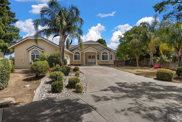 3704 Chapparal Ct, Fairfield, CA 94534 - view of front of property with driveway, stucco siding, and fence