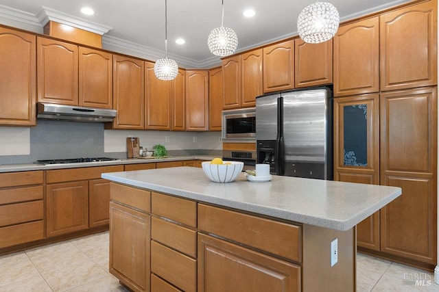 3704 Chapparal Ct, Fairfield, CA 94534 - kitchen with under cabinet range hood, appliances with stainless steel finishes, light tile patterned floors, a kitchen island, and crown molding