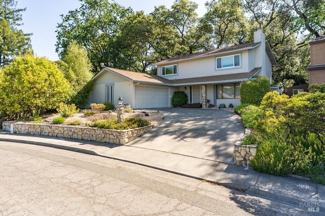 436 Candlelight Dr, Santa Rosa, CA 95403 - traditional home featuring a garage, driveway, a chimney, and a porch