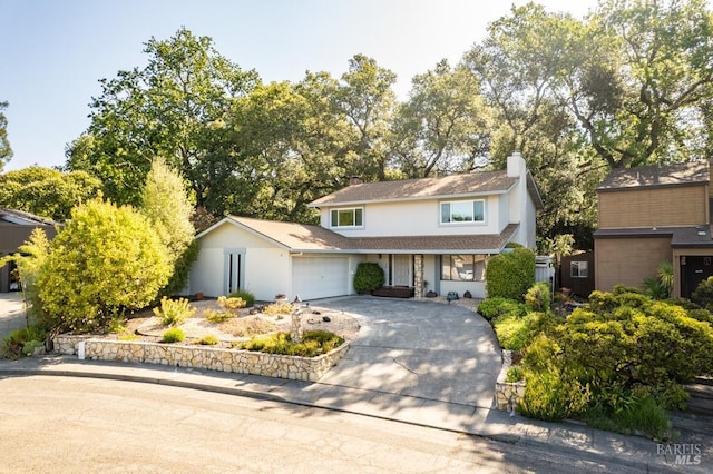 436 Candlelight Dr, Santa Rosa, CA 95403 - traditional home with a garage, driveway, a porch, stucco siding, and a chimney
