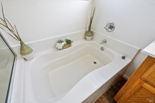 5151 Freitas Pl, Fairfield, CA 94533 - bathroom with a bath and a textured wall