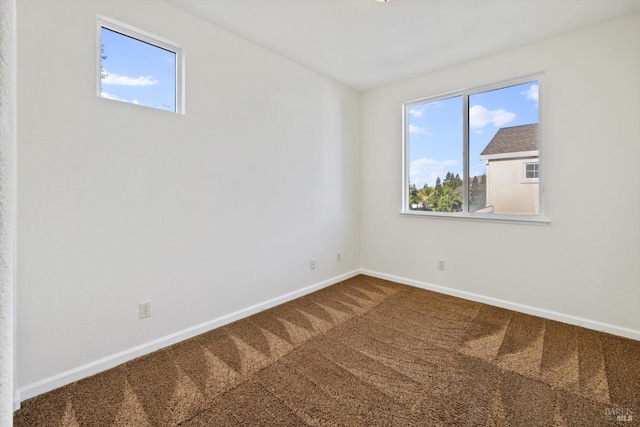 5151 Freitas Pl, Fairfield, CA 94533 - unfurnished room featuring carpet, plenty of natural light, and baseboards