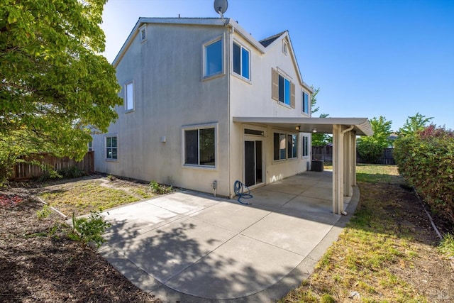 5151 Freitas Pl, Fairfield, CA 94533 - back of property featuring stucco siding, a fenced backyard, a patio area, and cooling unit