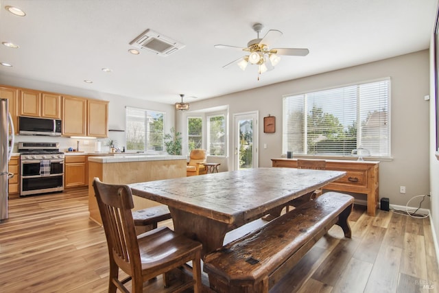 670 Turnberry Ter, Rio Vista, CA 94571 - dining room featuring light wood finished floors, recessed lighting, a ceiling fan, and baseboards