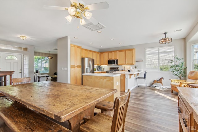 670 Turnberry Ter, Rio Vista, CA 94571 - dining area featuring light wood-style flooring, recessed lighting, baseboards, and a ceiling fan