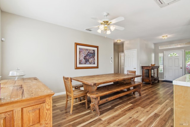670 Turnberry Ter, Rio Vista, CA 94571 - dining space featuring light wood-style flooring, baseboards, and a ceiling fan